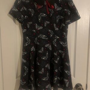 Katakomb black and moth mini dress.
